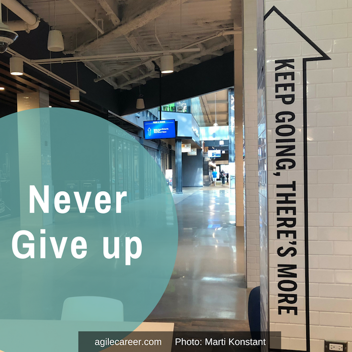 Neve-give-up-graphic-with-keep-going-sign